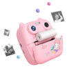 Cámara de fotos con impresión portátil infantil Childrens Time - rosa - vista lateral con fotos impresas volando Cámara de fotos con impresión portátil infantil Children's Time