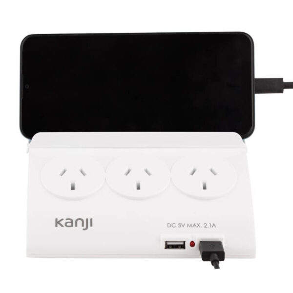 Prolongador con estabilizador de corriente Kanji SL9205 - portacelular y puerto USB en uso Prolongador con estabilizador de corriente Kanji SL9205 - portacelular y puerto USB en uso