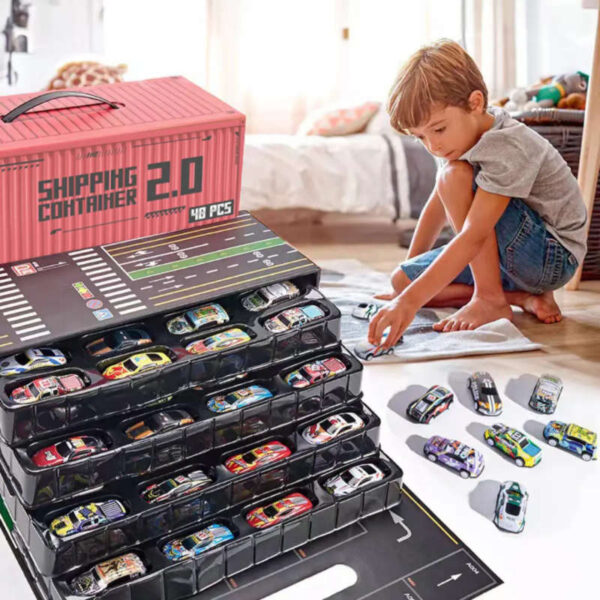 Set de 48 autitos con caja contenedora Zumo - chico jugando Set de 48 autitos con caja contenedora Zumo - chico jugando
